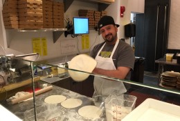 Daniel Salamanca gets dough ready at Veloce. (WTOP/Kristi King)