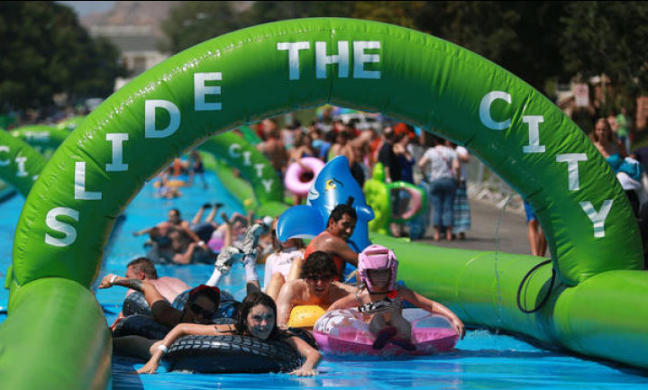 The D.C> Slide the City event is just one of many outdoor athletic activities to partake in this summer.