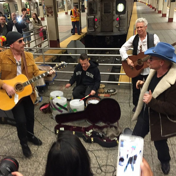 U2 makes surprise appearance on NY subway platform