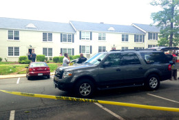 An Arlington County police officer shot and killed a man involved in a domestic dispute at the Gates of Ballston apartment complex Tuesday morning.  (WTOP/Megan Cloherty)
