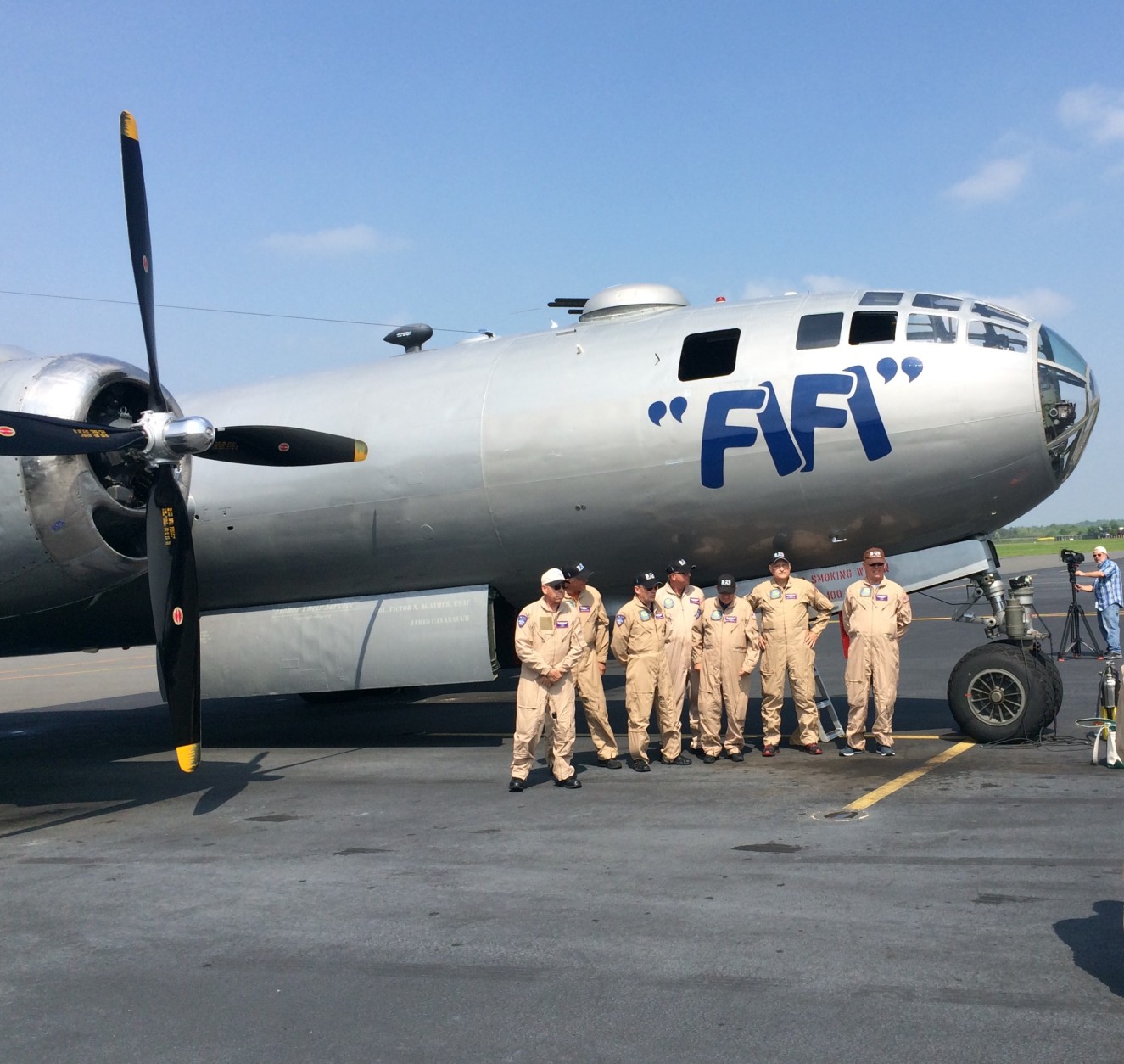 The Commemorative Air Force crew stands by "FIFI" the B-29 Super Fortress.  (WTOP/Mike Murillo)