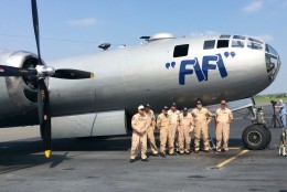 The Commemorative Air Force crew stands by "FIFI" the B-29 Super Fortress.  (WTOP/Mike Murillo)