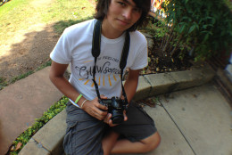 A student and his camera. (Leslie Mansour/CHAW)