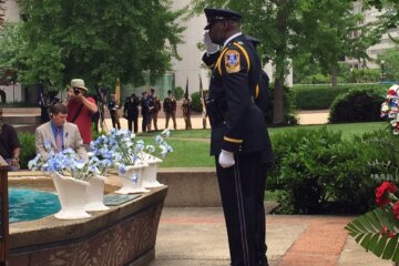Officers salute a fallen comrade at the Washington Area Law Enforcement Officers Memorial