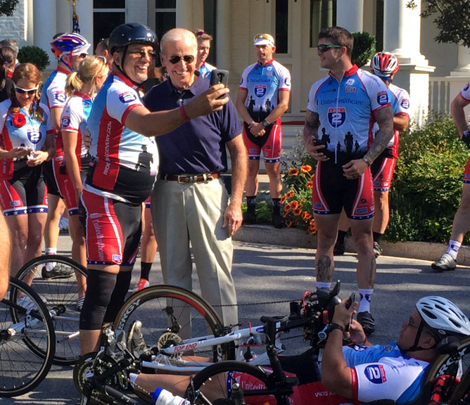 Vice President Joe Biden greets cyclists as they prepare to take part in the Ride2Recovery outside the vice president's residence Monday morning in D.C. The riders will trek to Virginia Beach. (WTOP/Kristi King)