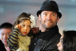 Actor Hugh Jackman holds his daughter Ava during a boxing competition charity event to benefit The East Harlem School at Exodus House, Wednesday, May 13, 2009 at the Aerospace High Performance Center in New York. (AP Photo/Evan Agostini)