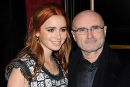 Actor Lily Collins, left and her father Phil Collins attend the Warner Bros. Pictures premiere of "The Blind Side," in New York, Tuesday, Nov. 17, 2009. (AP Photo/Peter Kramer)