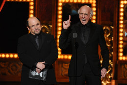 Jason Alexader, left, and Larry David present an award at the 69th annual Tony Awards at Radio City Music Hall on Sunday, June 7, 2015, in New York. (Photo by Charles Sykes/Invision/AP)