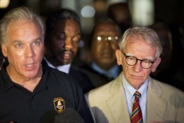 Charleston Mayor Joseph Riley, right, stands next to Police Chief Gregory Mullen as he addresses the media down the street from the Emanuel AME Church early Thursday, June 18, 2015 following a shooting Wednesday night in Charleston, S.C. (AP Photo/David Goldman)