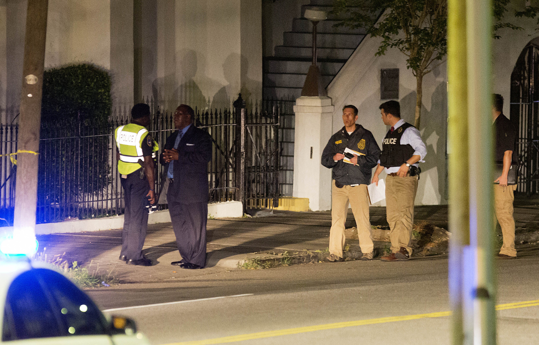 Police stand outside the Emanuel AME Church following a shooting Wednesday, June 17, 2015, in Charleston, S.C. (AP Photo/David Goldman)