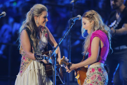 Tae Dye, left, and Maddie Marlow, of the musical group Maddie &amp; Tae, perform at the CMT Music Awards at Bridgestone Arena on Wednesday, June 10, 2015, in Nashville, Tenn. (Photo by Wade Payne/Invision/AP)