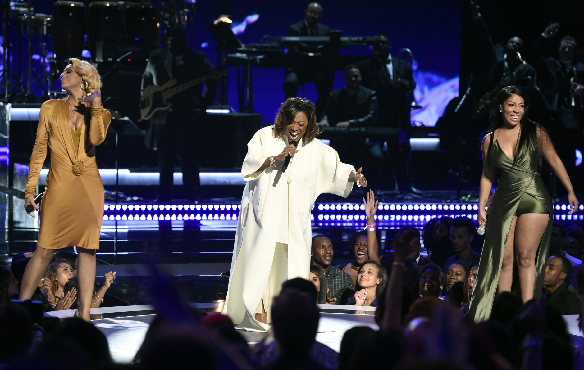 Tamar Braxton, from left, Patti LaBelle, and K. Michelle perform at the BET Awards at the Microsoft Theater on Sunday, June 28, 2015, in Los Angeles. (Photo by Chris Pizzello/Invision/AP)