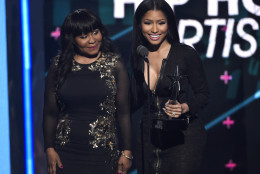 Carol Maraj, left, looks on as Nicki Minaj accepts the award for best female hip hop artist at the BET Awards at the Microsoft Theater on Sunday, June 28, 2015, in Los Angeles. (Photo by Chris Pizzello/Invision/AP)