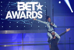 Hosts Tracee Ellis Ross, left, and Anthony Anderson speak at the BET Awards at the Microsoft Theater on Sunday, June 28, 2015, in Los Angeles. (Photo by Chris Pizzello/Invision/AP)