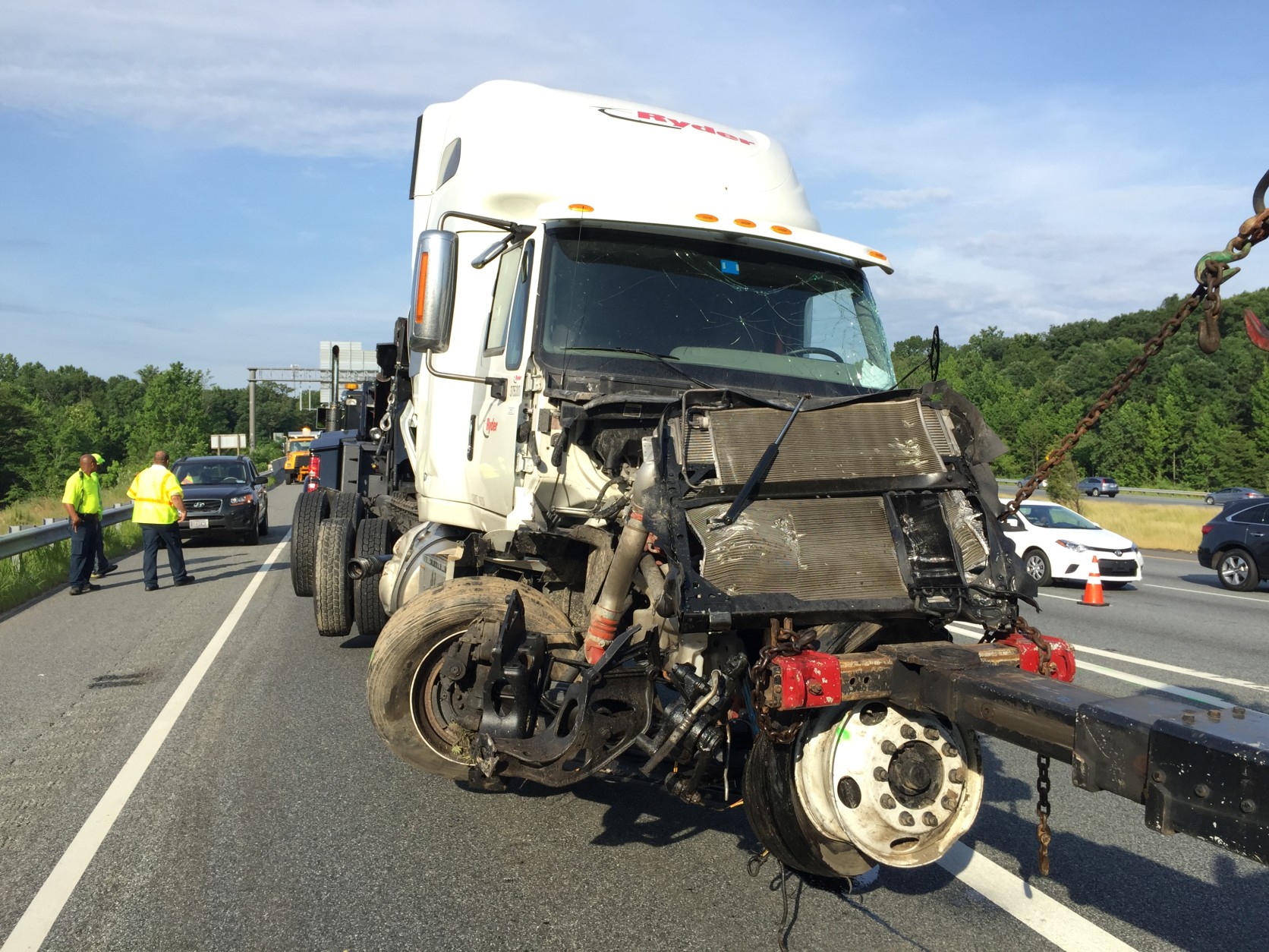 The cab involved in the fatal crash on I-95 in Beltsville is towed away. (WTOP/Kristi King)