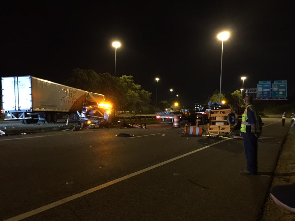 One man has died, another is injured and traffic is snarled after a crash involving a tractor-trailer and two construction vehicles on Interstate 95 at Md. 200. (WTOP/Kristi King)