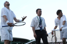 Isner laments as the second day of play is called on account of darkness. (AP Photo/Alastair Grant)