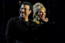 LAS VEGAS, NV - APRIL 02:  Musician Lionel Richie (L) and his daughter Nicole Richie perform onstage during Lionel Richie and Friends in Concert presented by ACM held at the MGM Grand Garden Arena on April 2, 2012 in Las Vegas, Nevada.  (Photo by Ethan Miller/Getty Images)