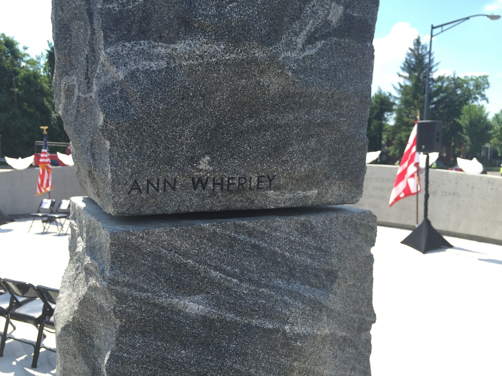 Each stone structure has a name engraved of one of the nine victims. (WTOP/Andrew Mollenbeck)