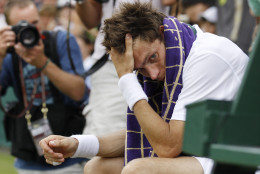 Mahut's agony in defeat was visible, but he has gone on to win all three of his titles since the marathon showdown.  (AP Photo/Suzanne Plunkett, Pool)