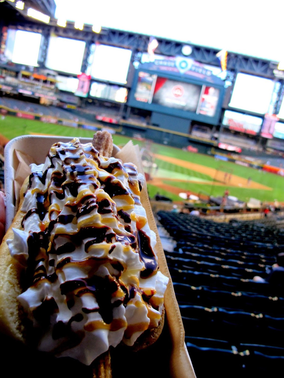 After all those savory dogs, time for a sweat break. The Arizona Diamondbacks offer the churro dog. The "bun" is really a chocolate-drizzled "long-john" doughnut. It holds a cinnamon churro topped with yogurt and whipped cream then more drizzled chocolate plus caramel sauces. Hot Dog Explorer ranking: 29. (Courtesy Tom Lohr)