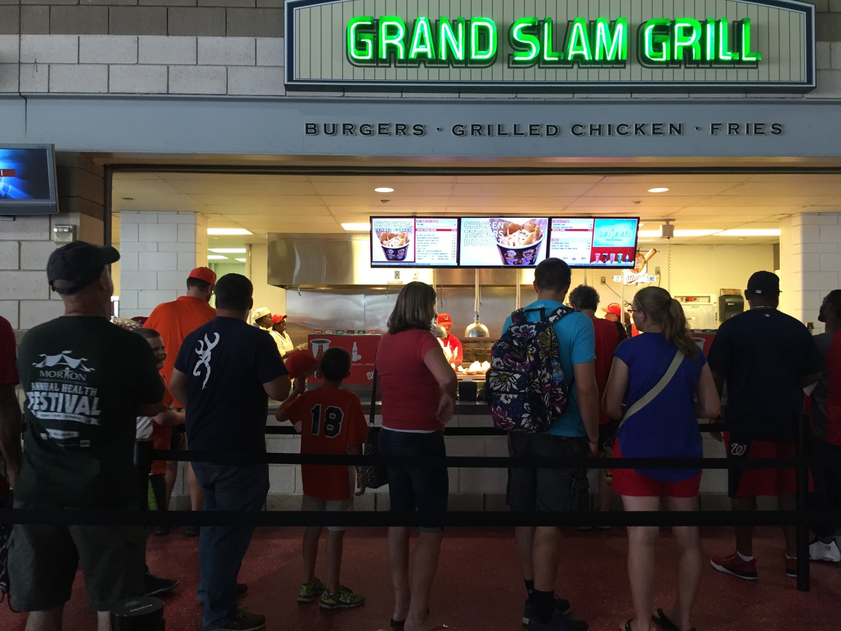 Lohr stands in line to order at Nationals Park. (Photo: WTOP/Andrew Mollenbeck)
