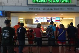 Lohr stands in line to order at Nationals Park. (Photo: WTOP/Andrew Mollenbeck)
