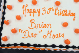 A Birthday cake marks Brian's 30th shared by family and friends.  (WTOP/Dick Uliano)