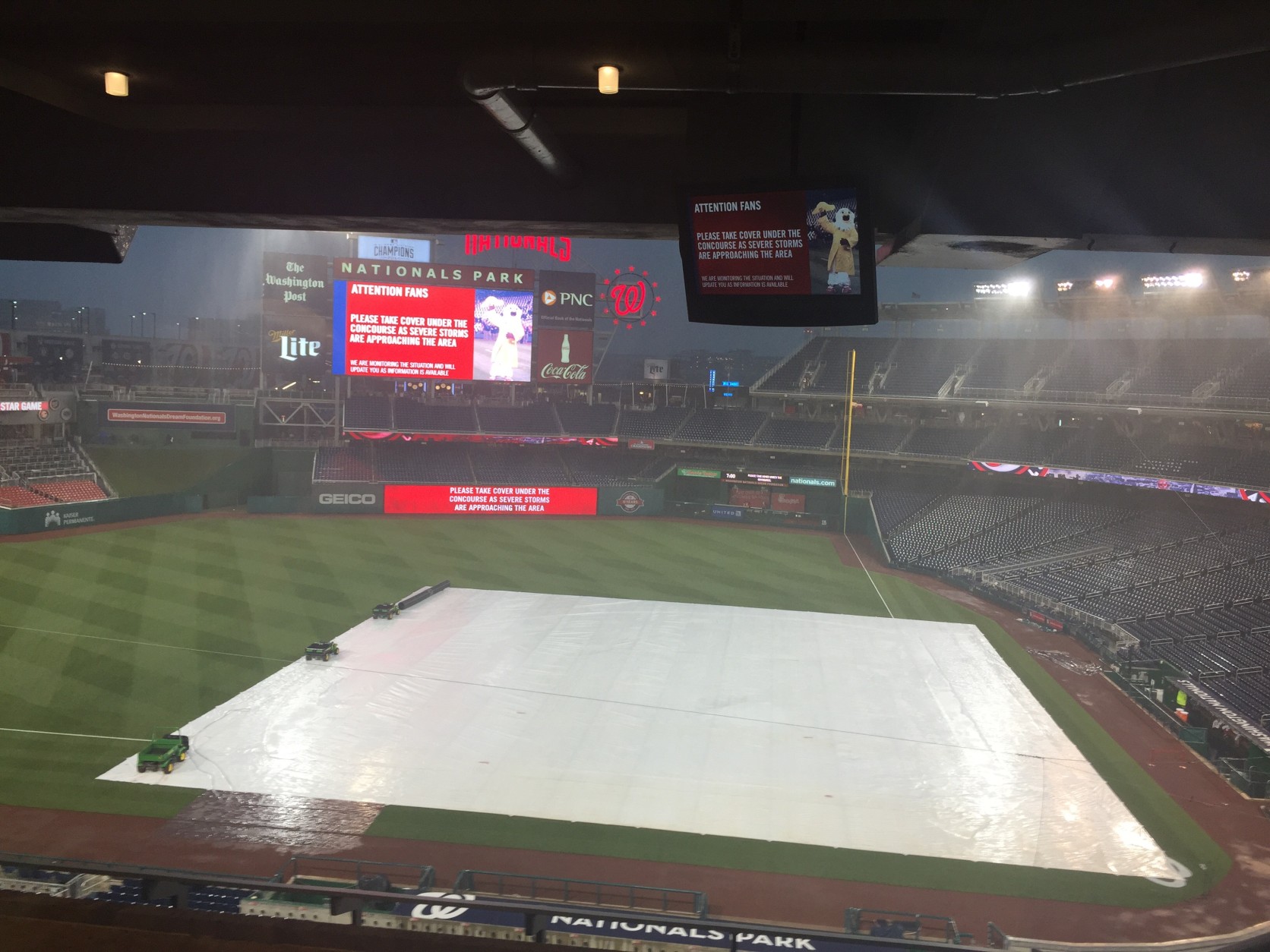 A soggy Nationals Park on Tuesday evening. (WTOP/Rick Hinshaw)