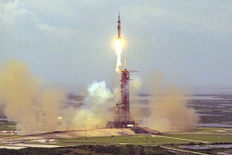 In 1975, three American astronauts blasted off aboard an Apollo spaceship hours after two Soviet cosmonauts were launched aboard a Soyuz spacecraft for a mission that included a linkup of the two ships in orbit. The Saturn IB rocket lifts off from NASA's Kennedy Space Center in Florida on July 15, 1975, carrying Thomas P. Stafford, Vance D. Brand, Donald K. Slayton in an Apollo capsule. (Courtesy NASA)