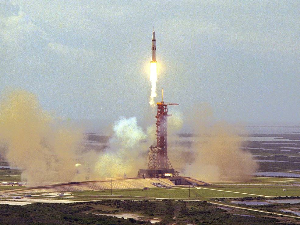 In 1975, three American astronauts blasted off aboard an Apollo spaceship hours after two Soviet cosmonauts were launched aboard a Soyuz spacecraft for a mission that included a linkup of the two ships in orbit. The Saturn IB rocket lifts off from NASA's Kennedy Space Center in Florida on July 15, 1975, carrying Thomas P. Stafford, Vance D. Brand, Donald K. Slayton in an Apollo capsule. (Courtesy NASA)