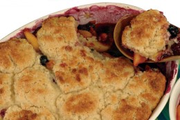 ** FOR USE WITH AP WEEKLY FEATURES **  Peach and Berry Almond Cobbler combines delectable summer fruits in a familiar dessert with a nontraditional bonus almond flavor in its dough, which includes almond paste. It's simple to make from scratch. (AP Photo/Andre Prost/Odense)