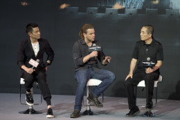 Actor Matt Damon, center, speaks next to Hong Kong movie star Andy Lau, left, and director Zhang Yimou, right, during a press conference of their latest movie The Great Wall held at a hotel in Beijing, China, Thursday, July 2, 2015. Zhang Yimou says that the Sino-U.S. fantasy adventure movie set around the building of the Great Wall and starring Matt Damon combines a Chinese land and story with Hollywood monsters.  (AP Photo/Andy Wong)