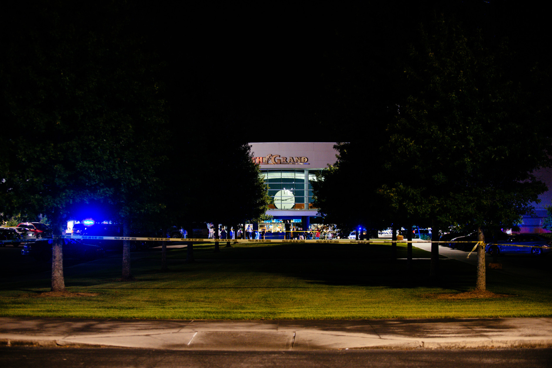 Police tape marls off the area of a deadly shooting at the Grand Theatre in Lafayette, La., Thursday, July 23, 2015. (AP Photo/Denny Culbert)