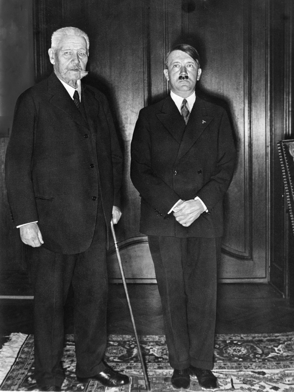 German Reichs Chancellor Adolf Hitler, left, poses with President Paul von Hindenburg in Berlin early 1934. (AP Photo)