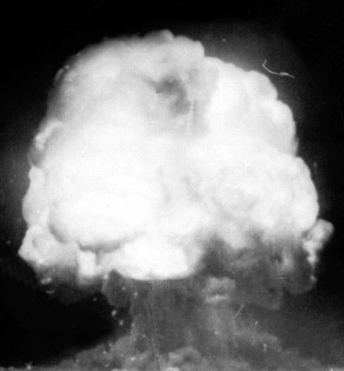 The first U.S. atom bomb explodes during a test in Alamogordo, N.M., July 16, 1945.  The cloud went 40,000 feet in the air, as viewed by an automatic camera six miles away from the site.  (AP Photo)