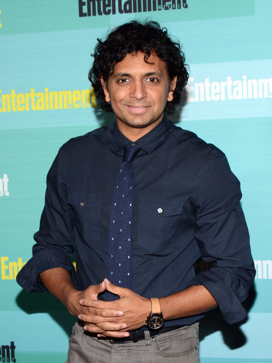 Writer-director M. Night Shyamalan is 45 on Aug. 6. Here, Shyamalan arrives at Entertainment Weekly's Annual Comic-Con Party at FLOAT at the Hard Rock Hotel on Saturday, July 11, 2015 in San Diego, Calif. (Photo by Tonya Wise/Invision/AP)