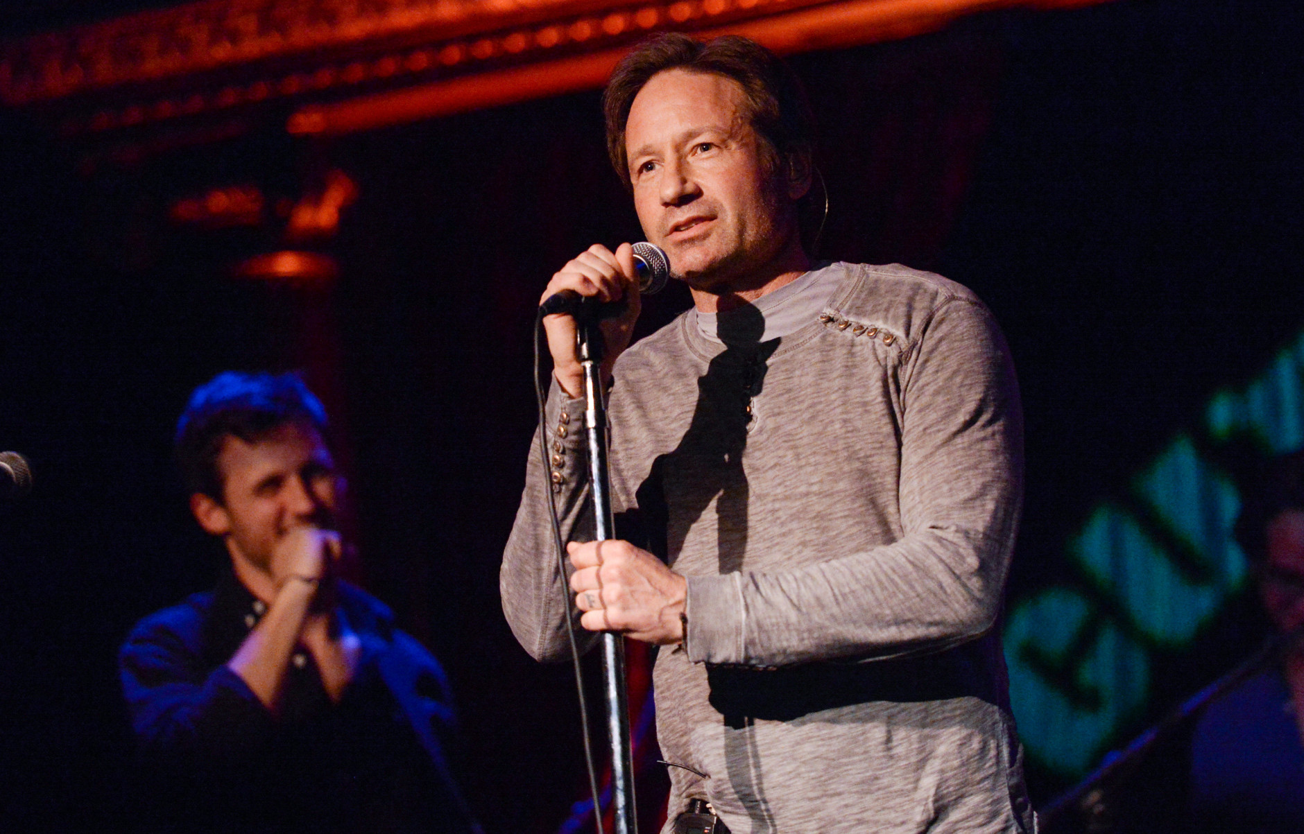 Actor David Duchovny is 55 on Aug. 7. Here, Duchovny performs at The Cutting Room, in support of the release of his debut album "Hell Or Highwater," on Tuesday, May 12, 2015, in New York. (Photo by Evan Agostini/Invision/AP)