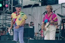 American singer Mike Love, left, and guitarist-singer Al Jardine of The Beach Boys perform onstage at JFK Stadium in Philadelphia Pa. during the Live Aid famine relief concert July 13, 1985. (AP Photo/Amy Sancetta)