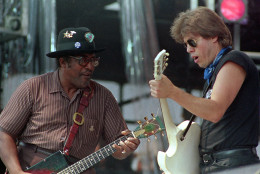 Bo Diddley, left, and George Thorogood perform together onstage during the Live Aid concert for famine relief at JFK Stadium in Philadelphia, Pa. July 13, 1985.(AP Photo/stf)
