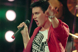 ** FILE ** British singer Simon LeBon of Duran Duran performs at JFK Stadium in Philadelphia Pa. during the Live Aid famine relief concert July 13, 1985. Justin Timberlake is working on Duran Duran's new album, along with superproducer Timbaland, who created recent smash hits for both Timberlake and Nelly Furtado, the British band said. (AP Photo/Amy Sancetta)