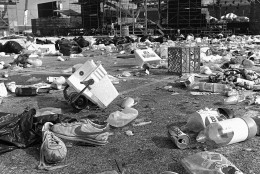 Trash and misplaced possessions cover the infield of Philadelphia's JFK Stadium early Sunday, July 14, 1985, the morning after the day-long Live Aid concert.  (AP Photo/Amy Sancetta)