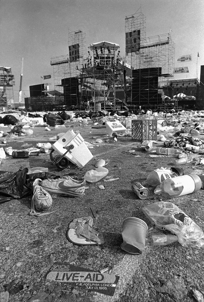 Trash and misplaced possessions cover the infield of Philadelphia's JFK Stadium early Sunday, July 14, 1985, the morning after the day-long Live Aid concert.  (AP Photo/Amy Sancetta)