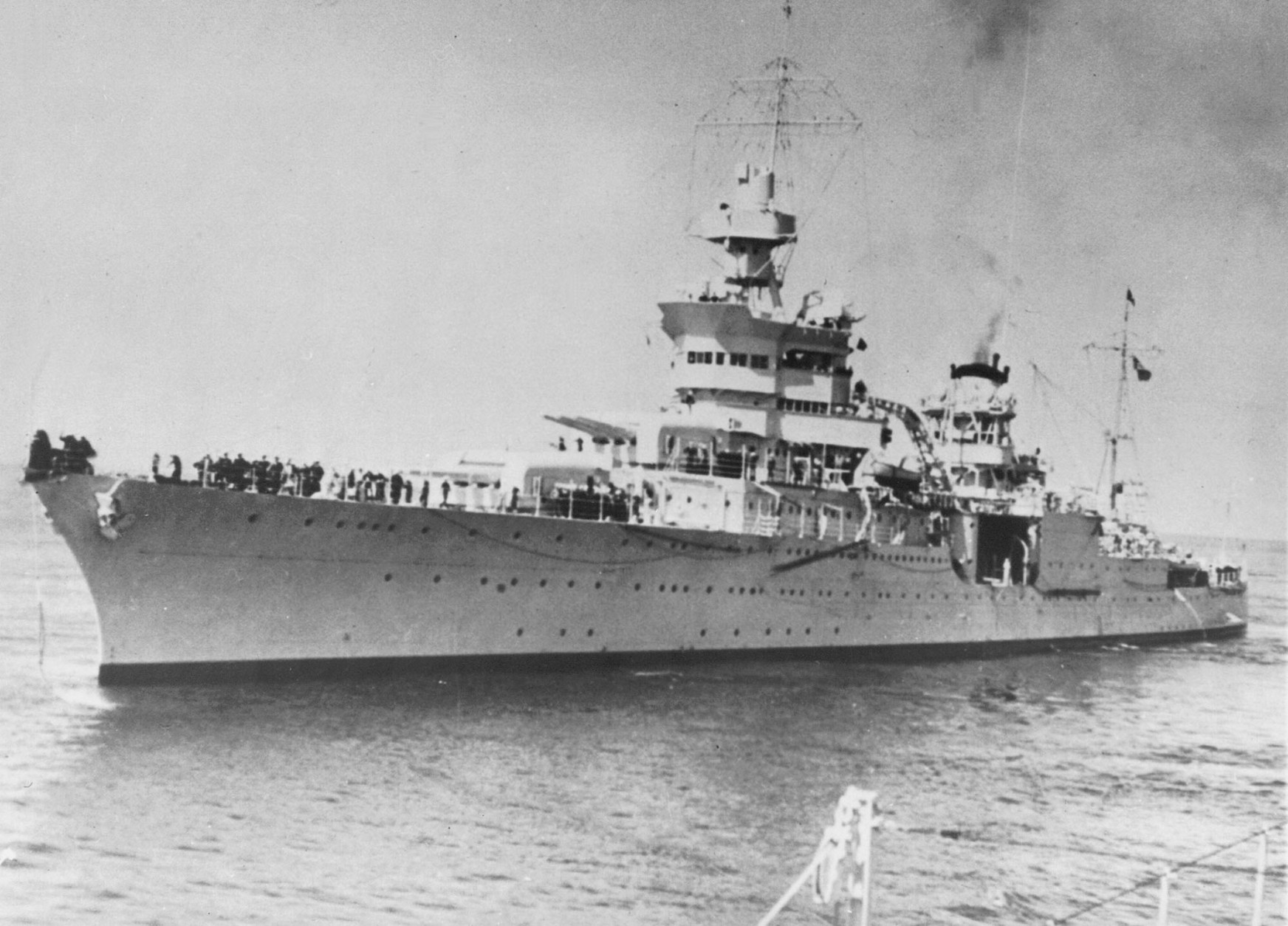 On this date in 1945, the Portland class heavy cruiser USS Indianapolis, having just delivered components of the atomic bomb to Tinian in the Mariana Islands, was torpedoed by a Japanese submarine. (AP Photo)