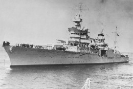 On this date in 1945, the Portland class heavy cruiser USS Indianapolis, having just delivered components of the atomic bomb to Tinian in the Mariana Islands, was torpedoed by a Japanese submarine. (AP Photo)