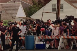 In 1999, John F. Kennedy Jr., his wife, Carolyn, and her sister, Lauren Bessette, died when their single-engine plane, piloted by Kennedy, plunged into the Atlantic Ocean near Martha's Vineyard, Massachusetts. Reporters surround the Kennedy Compound in Hyannisport, Mass., Saturday, July 17, 1999 after the wedding of Rory Kennedy, daughter of the late Robert Kennedy, was postponed after John F. Kennedy Jr., his wife and her sister were reported missing after their plane disappeared Friday night flying into Martha's Vineyard for the wedding. (AP Photo/Jim Cole)