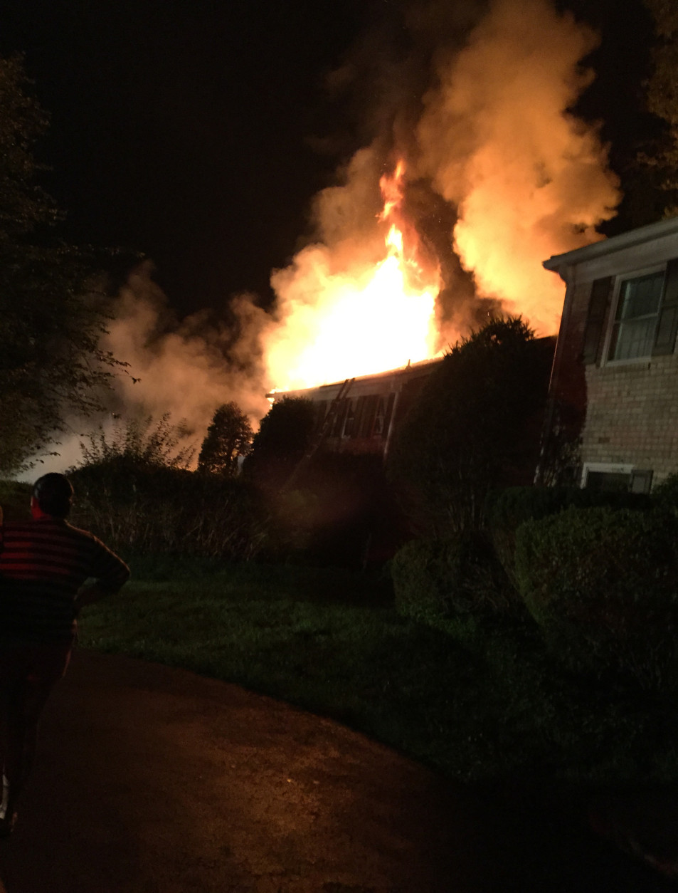 In this photo taken by a neighbor, the house on White Drive in Colesville burns. (Courtesy of Bryan Ramirez)