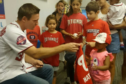 Washington Nationals starting pitcher Stephen Strasburg  meets with young fans at Anacostia Library in Washington, D.C., on Saturday,  July 18, 2015. ( Dennis J. Foley/WTOP)