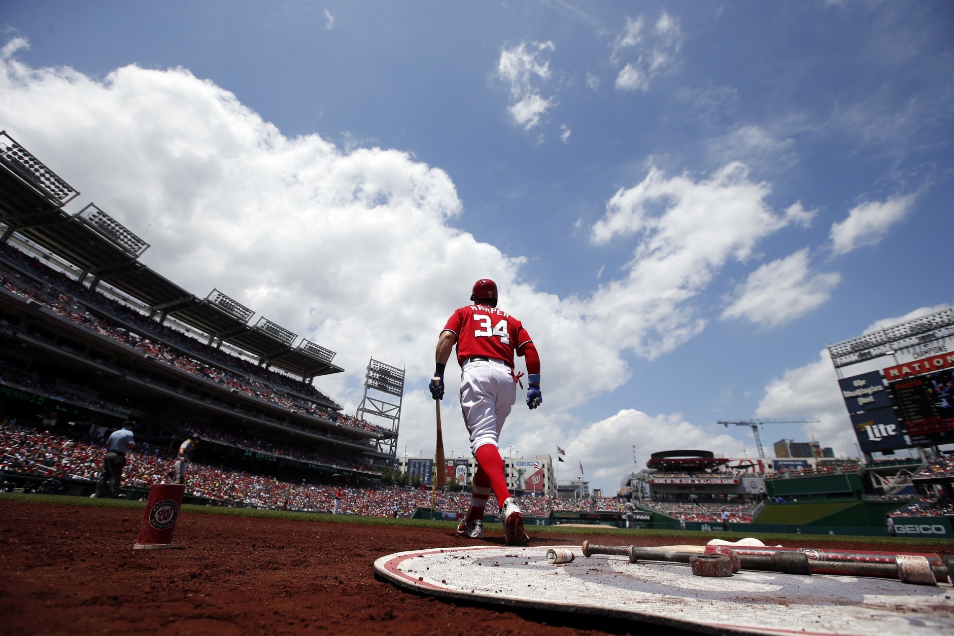 Washington Nationals' Bryce Harper (34) walks to bat during the first inning of a baseball game against the Pittsburgh Pirates at Nationals Park, Sunday, June 21, 2015, in Washington. (AP Photo/Alex Brandon)
