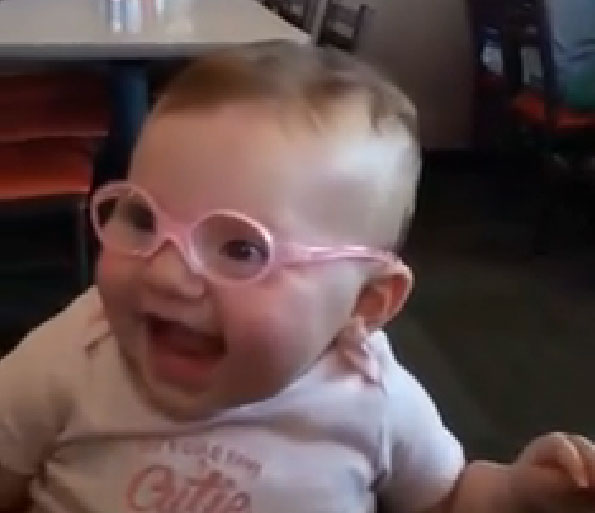Baby tries on glasses for first time; mind is (adorably) blown
